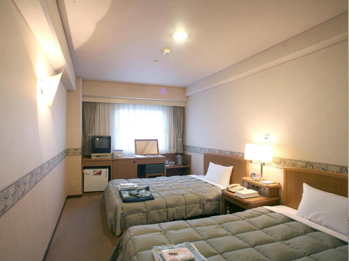 Hotel Kotohira Onsen Kotosankaku Zimmer foto